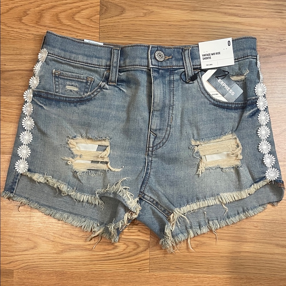 Express Blue Distressed Jean Shorts with White Floral Accents